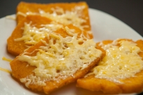 Fried Funchi with melted cheese